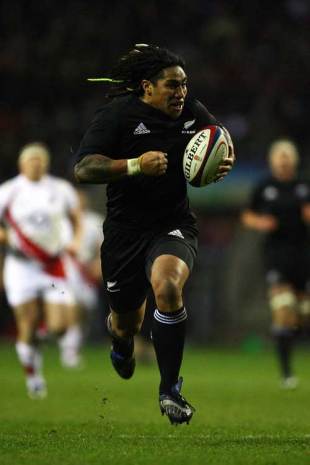New Zealand's Ma'a Nonu races away to score his try during the match between England and New Zealand at Twickenham in London, England on November 29, 2008.