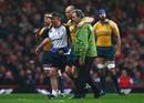Australia's Stirling Mortlock leaves the pitch after a collision
