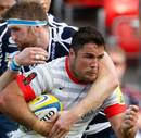 Saracens' Brad Barritt is stopped by Sale's Richie Vernon
