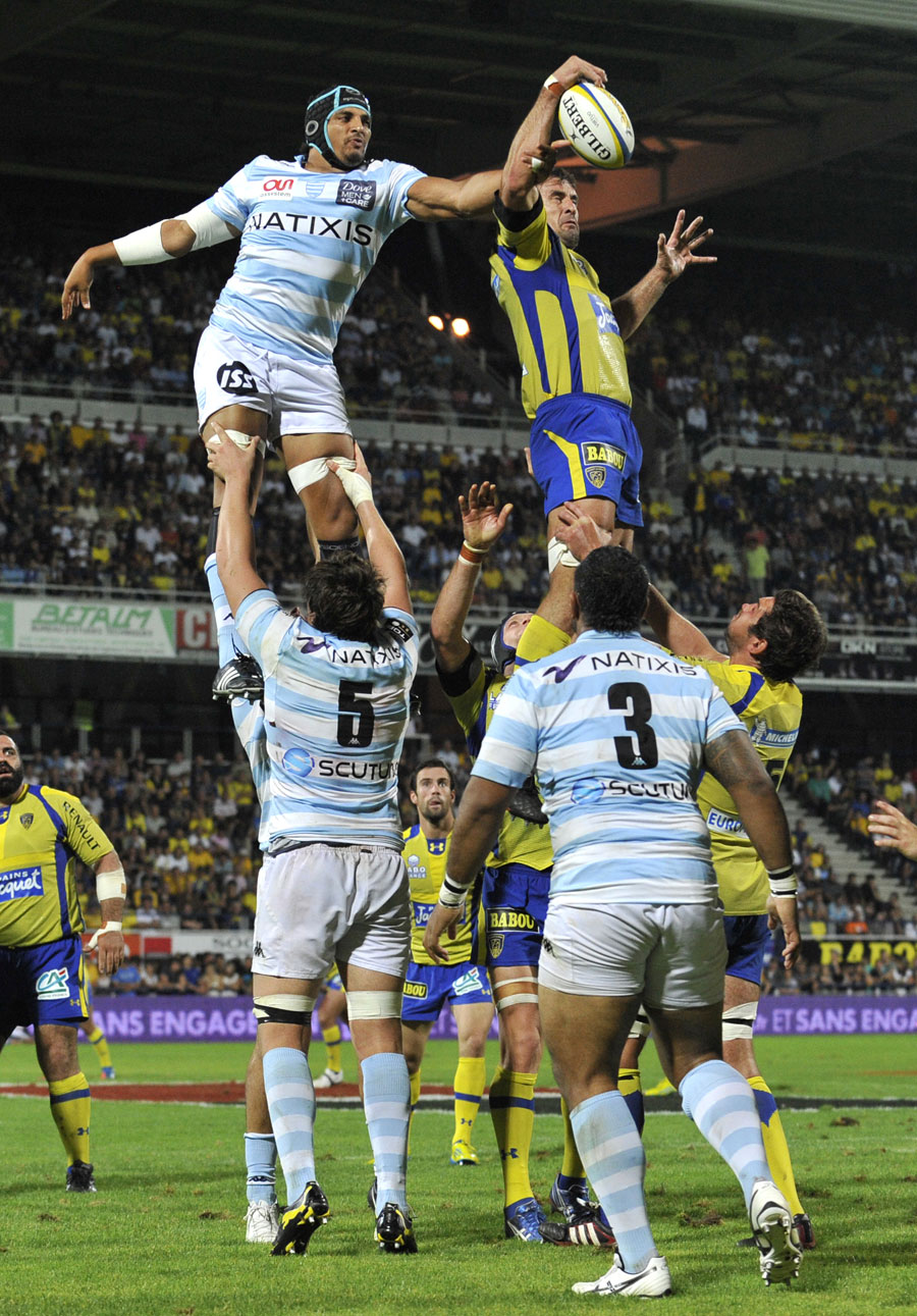 Racing Metro's Karim Ghezal and Clermont's Julien Pierre compete for the ball 