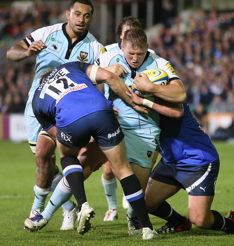 Northampton's Dylan Hartley looks to force an opening in the Bath defence