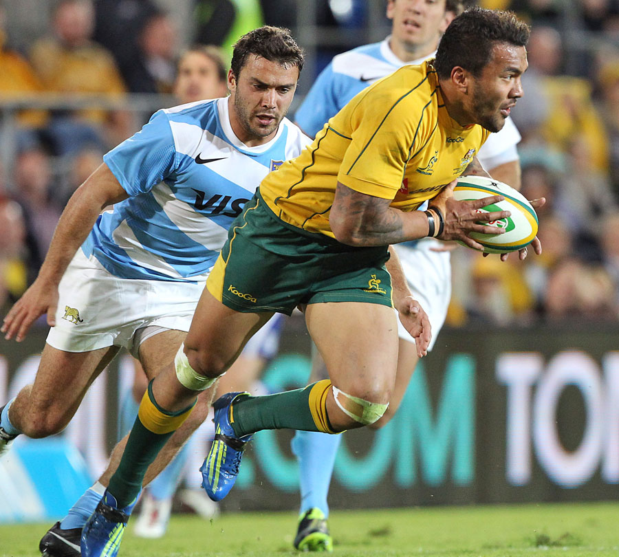 Australia's Digby Ioane evades the Argentina defence