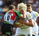 Harlequins' Nick Evans gets to grips with Richie Gray