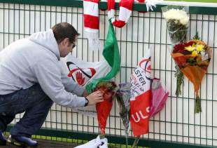 Flowers are laid at Ravenhill in memory of Nevin Spence
