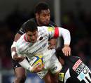 Saracens' Brad Barritt is felled by the Chiefs defence