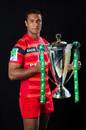 Toulouse's Thierry Dusautoir clasps the Heineken Cup