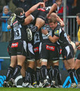 Exeter celebrate a try against Saracens