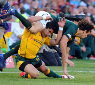 Australia's Anthony Faingaa tackles South Africa's Zane Kirchner, South Africa v Australia, The Rugby Championship, Loftus Versfeld, Pretoria, South Africa, September 29, 2012