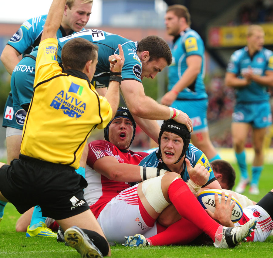 Gloucester's Tom Savage looks to the referee for confirmation of his try