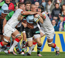 Harlequins' Mike Brown is shackled by the Saracens defence