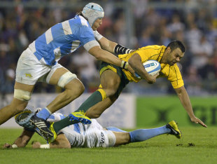 Australia's Kurtley Beale is felled by the Argentina defence, Argentina v Australia, Rugby Championship, Gigante de Arroyito, Rosario, Argentina., October 6, 2012