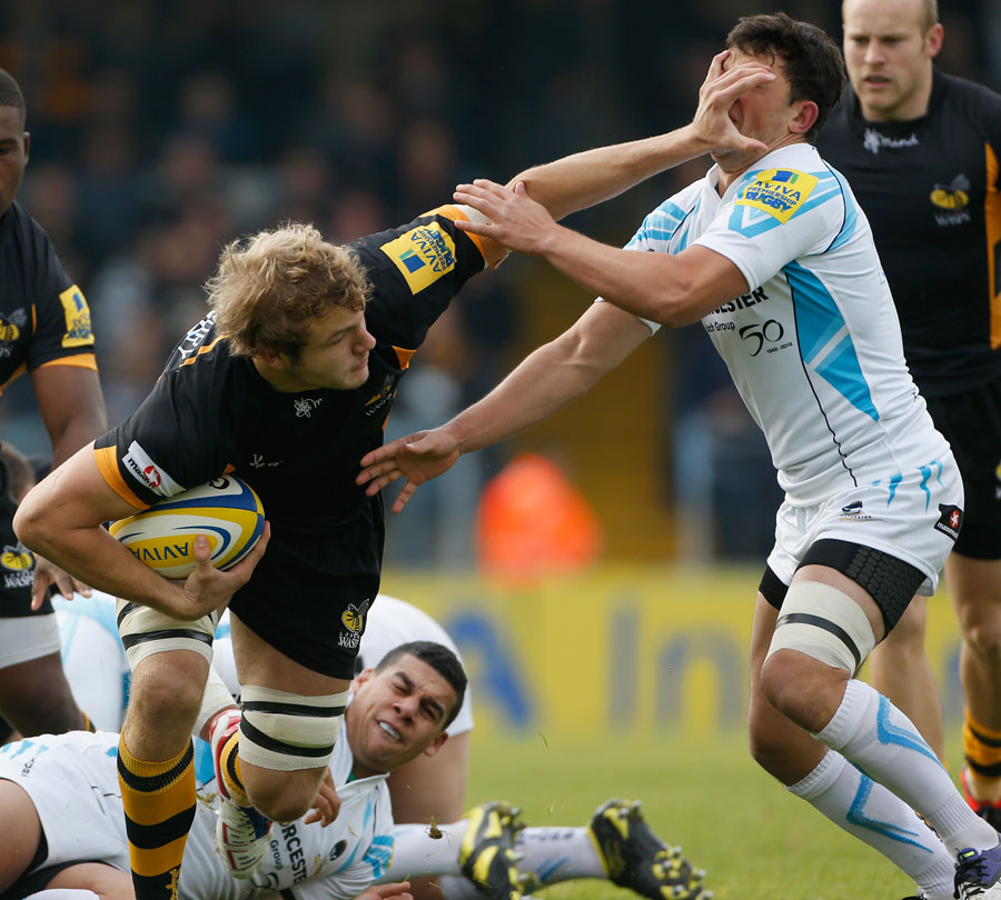 Wasps' Joe Launchbury powers through the Worcester defence