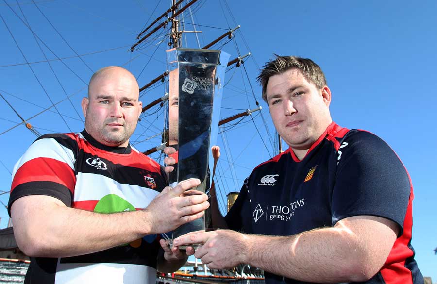 Stirling County's Alex Moffat and Dundee's Neil Dymock clasp the British and Irish 