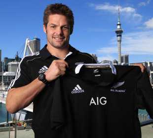 New Zealand skipper Richie McCaw poses with his side's new sponsored shirt