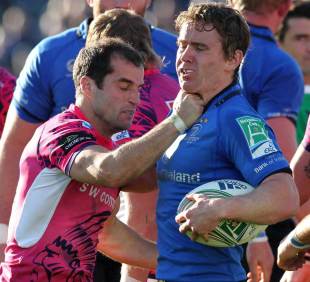 Exeter's Haydn Thomas gets to grips with Leinster's Eoin Reddan