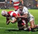 Gloucester's Will James powers over to score