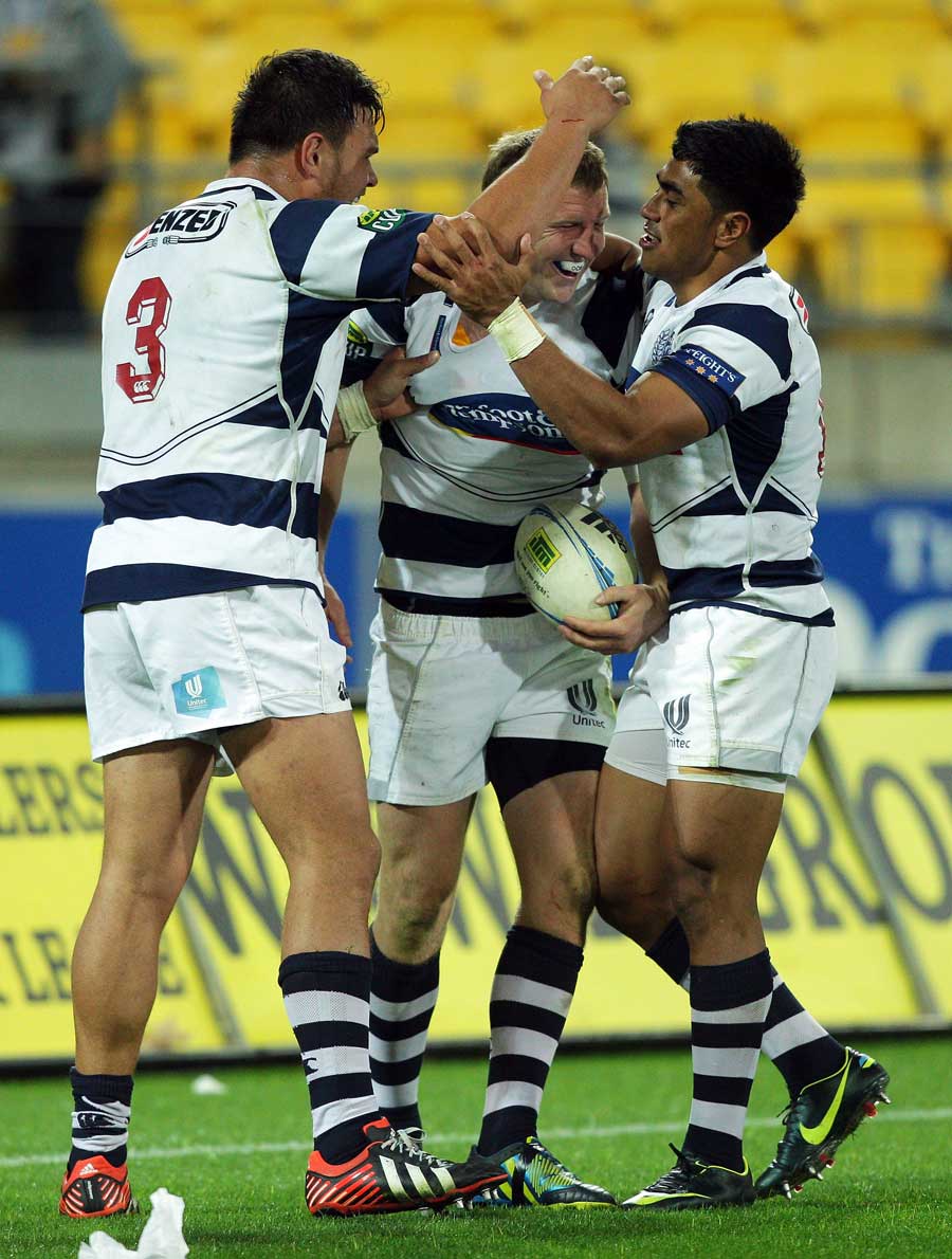 Auckland's Hadleigh Parkes celebrates a try