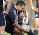 Italy boss Jacques Brunel gets to grips with Gonzalo Canale
