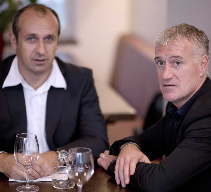 France coach Philippe Saint-Andre catches up with football boss Didier Deschamps