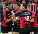 Canterbury's Tom Taylor is congratulated on a try