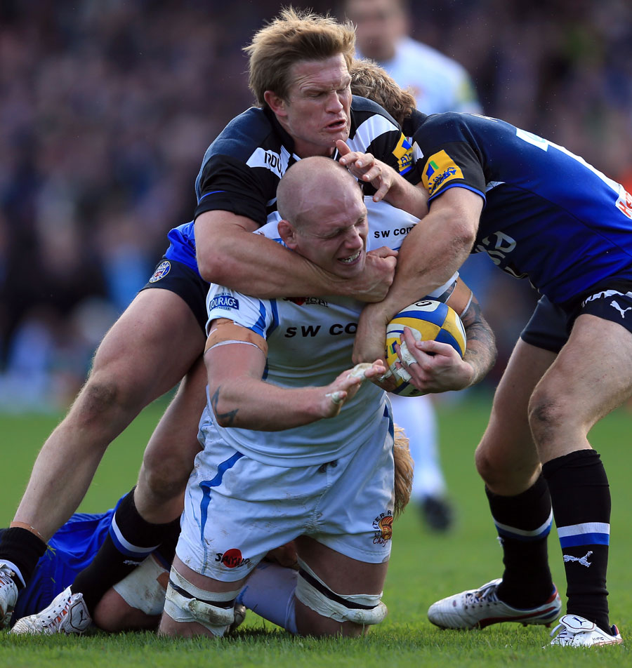 Exeter's James Scaysbrook is tackled by Bath's Michael Claassens