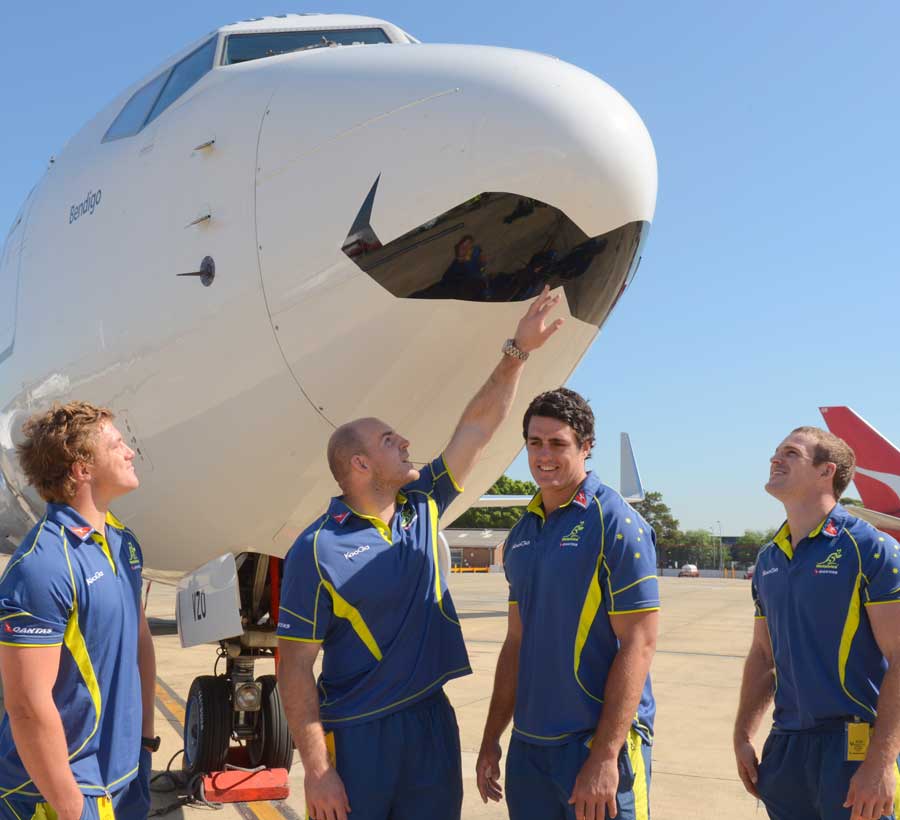 Australia's Michael Hooper, Stephen Moore, Dave Dennis and Pat McCabe pose next to an aircraft sporting a moustache to launch Movember