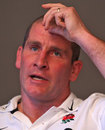 England coach Stuart Lancaster talks to reporters