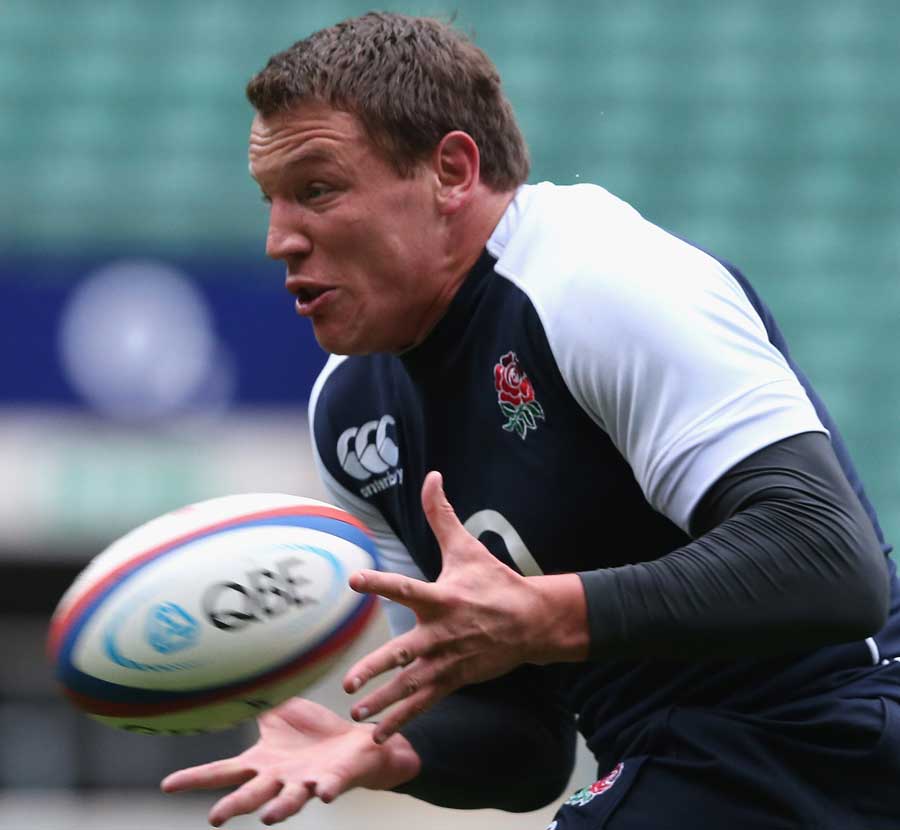 England's Tom Johnson takes the ball in the captain's run