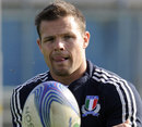 Italy's Kris Burton spins the ball in training