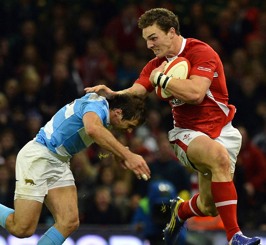 Wales' George North tries to escape the Argentina defence