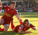 Scarlets' Andy Fenby scores a try 