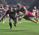 Exeter's Myles Dorrian dives over to score a try