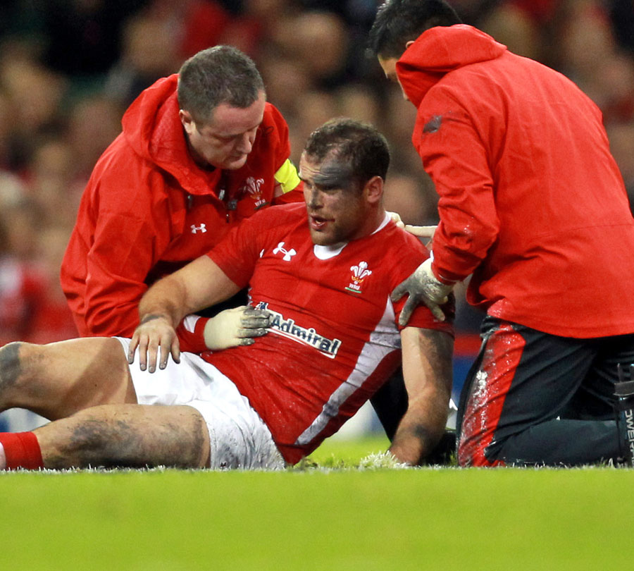 Wales' Jamie Roberts receives treatment