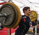 England's Alex Goode hits the weights 