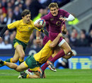 England's Toby Flood stretches the Australia defence