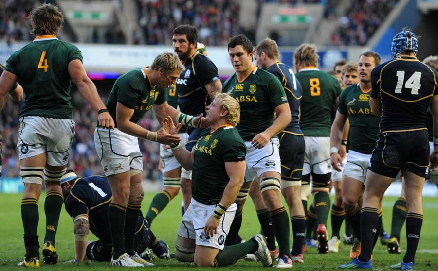 South Africa's Adriaan Strauss is congratulated on his score