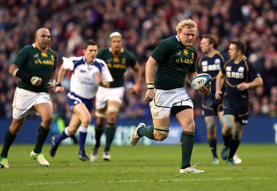 South Africa's Adriaan Strauss runs away for his try