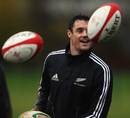New Zealand's Dan Carter watches on in training