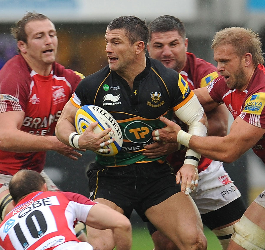 Tom May fights off the London Welsh defence
