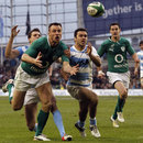 Ireland's Tommy Bowe chasing down the ball to score