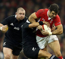 Mike Phillips tries to power through the New Zealand defence