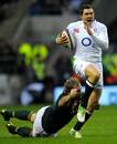 England's Alex Goode tries to break away