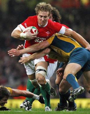 Wales' Andy Powell runs with the ball against Australia during the International friendly rugby match at the Millennium Stadium in Cardiff, Wales on November 29, 2008.