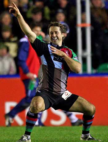 Harlequins Andy Gomarsall celebrates a try against Bath