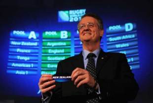 Bernard Lapasset the Chairman of Rugby World Cup Limited pulls out New Zealand during the IRB Rugby World Cup 2011 Pool Allocation Draw at Tower Bridge in London, England on December 1, 2008.