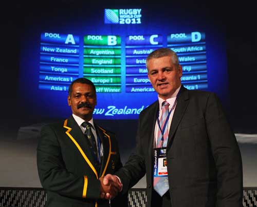 South Africa coach Peter de Villiers and Wales coach Warren Gatland shake hands at the RWC'11 pool draw