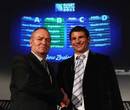 New Zealand head coach Graham Henry and France coach Marc Lievremont shake hands at the RWC'11 pool draw