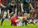 Wales' Aaron Jarvis suffers a knee injury