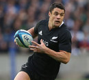 New Zealand's Dan Carter takes on the Scotland defence