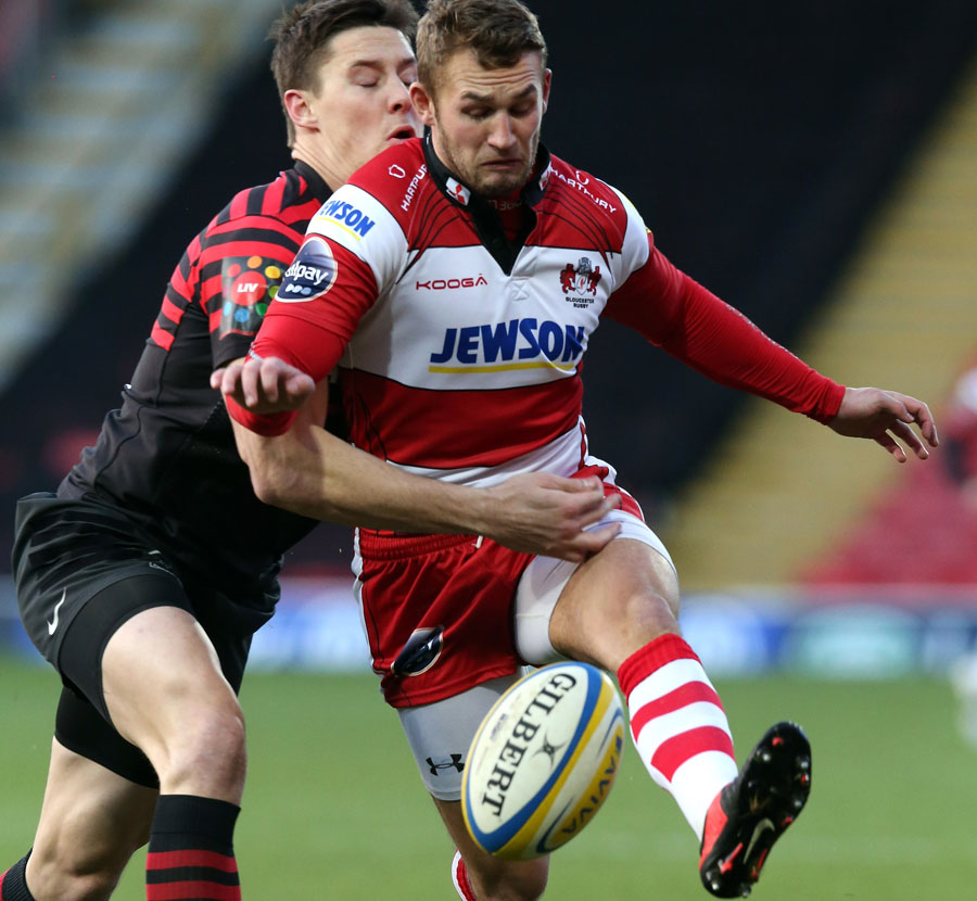 Gloucester's Martyn Thomas is tackled by Saracens' Joel Tomkins